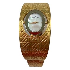 Vintage Anne Klein Rotating Head Bracelet Gold Tone Watch